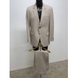 A quality vintage summer two piece two button suit by Daks. Size 42.