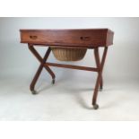 Teak mid century sewing table on castors with drawer and pull out basket and contents. W:70cm x D: