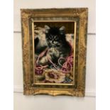 A framed material image of a kitten in ornate frame. Image:W:40cm x H:60cm. Frame:W:65cm x H:85cm