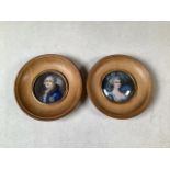 Two 19th early 20th century French miniature circular oils of a distinguished lady and gentlemen