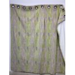 A pair of green chenille interlined eyelet curtains W:133cm x D:cm x H:246cm