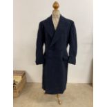 A mens six button wool long coat in navy blue. L:120cm. 44inch chest approx.