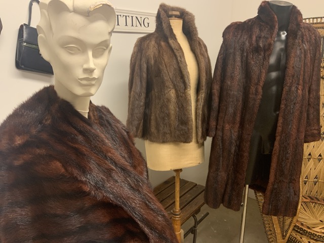 A 1950s musquash fur coat together with a 1950s mink fur jacket and a 1950s mink fur cape.