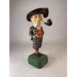 Penfold - A mid 20th century retro vintage shop advertising point of sale display figural stand