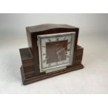 A Smiths Enfield Oak mantle clock with presentation plaque from Naval Ordnance Inspection Dept