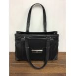 A black leather satchel bag by Braun Buffel.