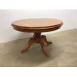 A heavy pine circular table. W:120cm x D:120cm x H:75cm