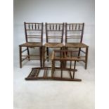 A set of four Arts and Crafts style rattan chairs. Sign of worm.