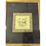 A framed Oriental embroidered square silk panel depicting a bird amongst foliage. W:34cm x H:42cm