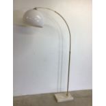A modern extendable metal curved lamp with marble base and adjustable plastic shade. W:128cm x H:
