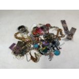 A collection of approx forty items of costume jewellery