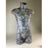 A male Mannequin torso embossed with comic images. H:87cm