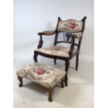 An Edwardian upholstered bedroom chair on castors and a footstool W:54cm x D:54cm x H:86cm