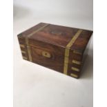 A Victorian mahogany and brass writing slope with fitted interior. With engraved plaque to top. A