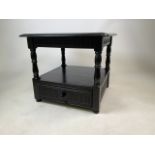 A black painted oak coffee table with drawer below. W:59cm x D:59cm x H:50cm