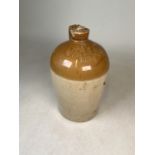 A Cornish salt glaze cider flagon marked Ching & Son, The Strand, Bude. W:20cm x D:20cm x H:32cm