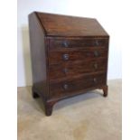 Georgian oak bureau with brass handles, pull out bars for desk with interior secretair in inlaid