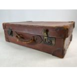 A vintage leather suitcace W:57cm x D:38cm x H:17cm