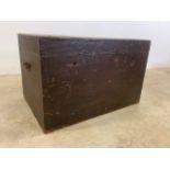 A large pine storage box for logs, coal or tools with metal edges and handle and tin lined interior.