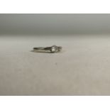 A 9ct white gold and diamond single stone ring, claw set 4mm diamond, approximately 0.25ct. 2g. Size