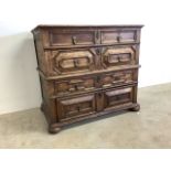 A part 17th century two part chest of drawers two short drawers over three long, brass acorn handles