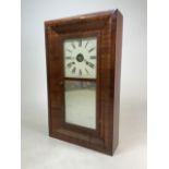 An American style mahogany wall clock with pendulum and weights. W:39cm x D:10.5cm x H:66cm