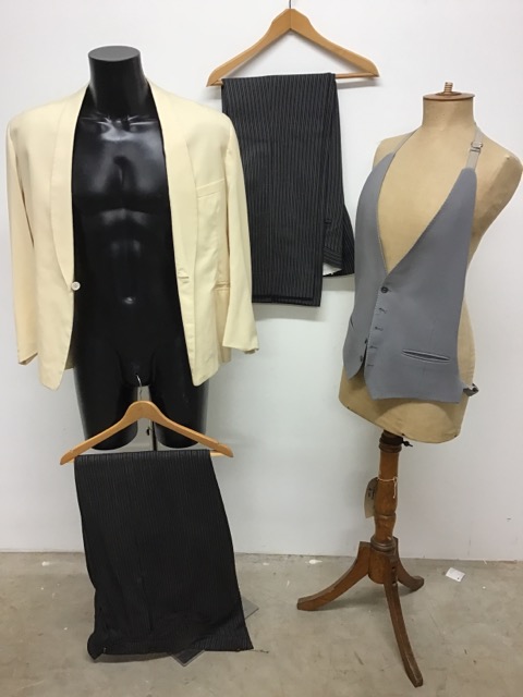 A white vintage dinner jacket and waistcoat together with two pairs of morning trousers.