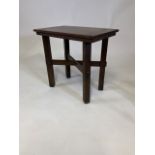 An Arts and Crafts side table in the manner of Gustav Stickley, rectangular top with flush post