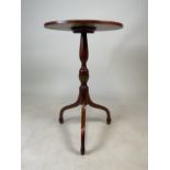 A mahogany wine table with painted floral details and tripod base. W:44cm x D:44cm x H:69cm