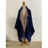 A velvet blue opera cloak with cotton lining