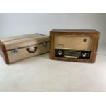 A Telefunken hi fi radio along with a 1960s suitcase.