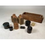 A collection of wood items to include treen boxes, wooden hip flasks, snuff box and a draw.