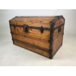 A vintage pine metal bound travelling trunk. W:83cm x D:49cm x H:54cm