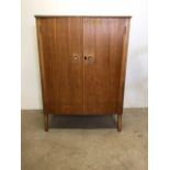 A mid century cupboard stamped Russell of Broadway. W:91cm x D:58cm x H:123cm