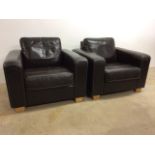 A pair of modern leather club chairs W:97cm x D:95cm x H:84cm