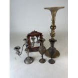 A large brass candle stick with two brass vase etc.