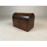 A dome topped walnut tea caddy. W:20cm x D:12cm x H:16cm