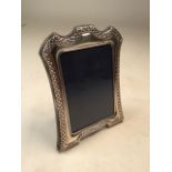 A sterling silver desk top picture frame by Carrs of Sheffield 1994. 18cm(h)