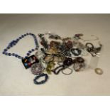 A collection of approximately sixty pieces of costume jewellery