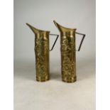 Two hammered brass jugs, stamped Le Lobelia. Made in Belgium. W:12cm x D:22cm x H:39.5cm (spout to