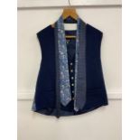 A Liberty & Co wool/cotton waistcoat in Strawberry Thief design together with a matching tie by Tana