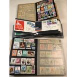 Large collection of stamps in two albums also with an album of first day covers.