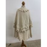 An 19th century embroidered pure silk cape- stains on the lining
