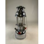 A modern Anchor stainless steel paraffin lamp. H:41cm
