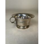 A sterling silver twin handled bowl on circular base. Sheffield 1919. Makers mark worn. 6.5ozt. W: