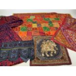 A selection of eastern textiles and needlework. Largest W:145cm x H:90cm