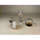 Two paperweights by Caithness, Scotland together with a Caithless style vase and an unmarked