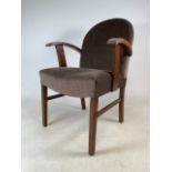 A mid century oak upholstered arm chair in the manner of Heals of London. W:59cm x D:45.5cm x H: