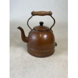 An early 20th century copper electric kettle.
