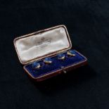 A pair of French 19th century Lapis Lazuli and 18ct gold Scarab beetle cuff links in fitted